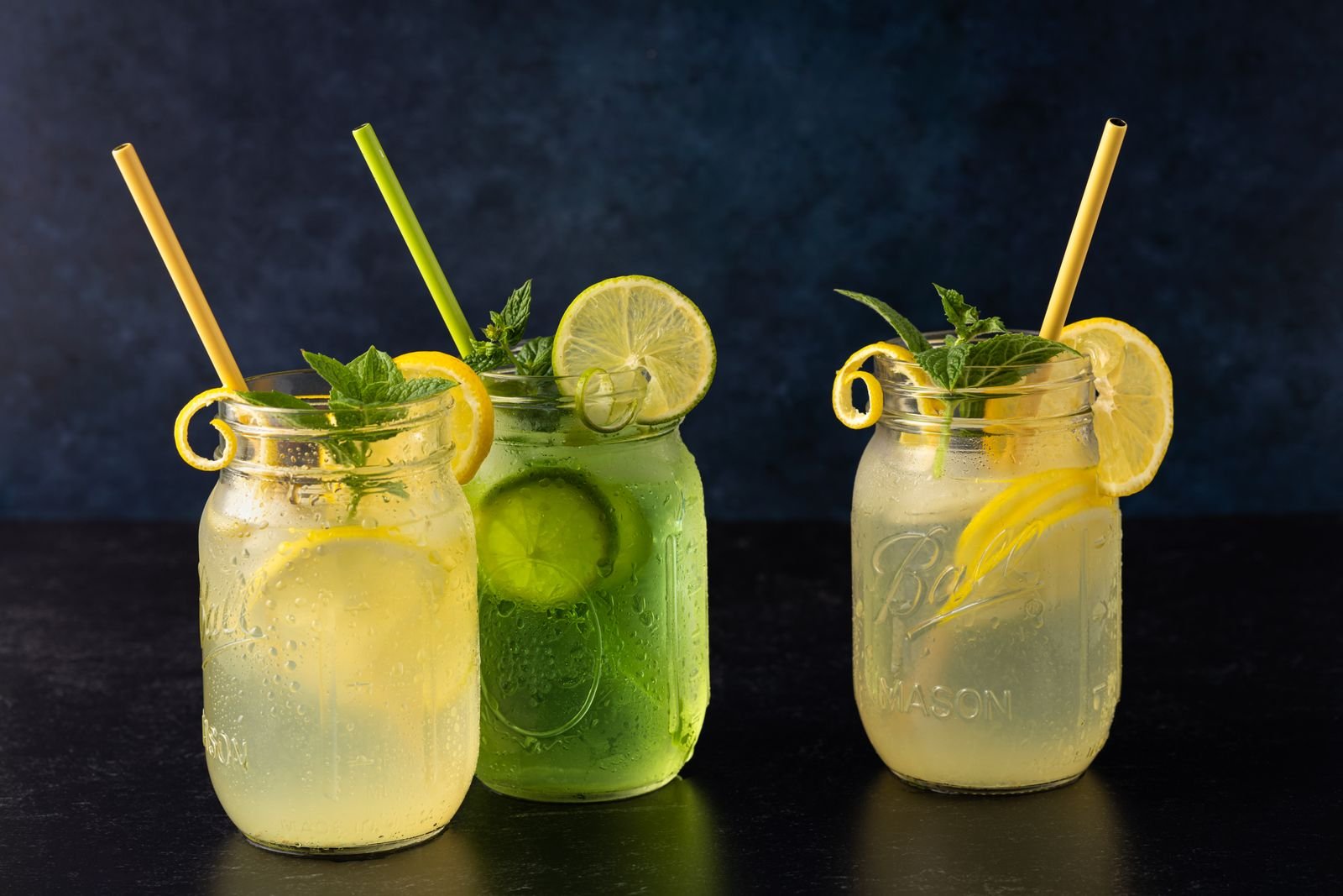Mojito mocktail in a mason jar with fresh mint and lime